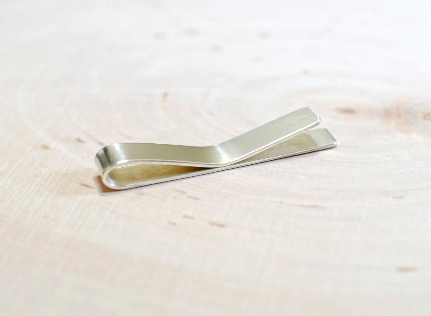 Father of the bride on a sterling silver tie clip