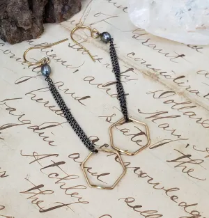 Golden hexagon earrings with patina chains