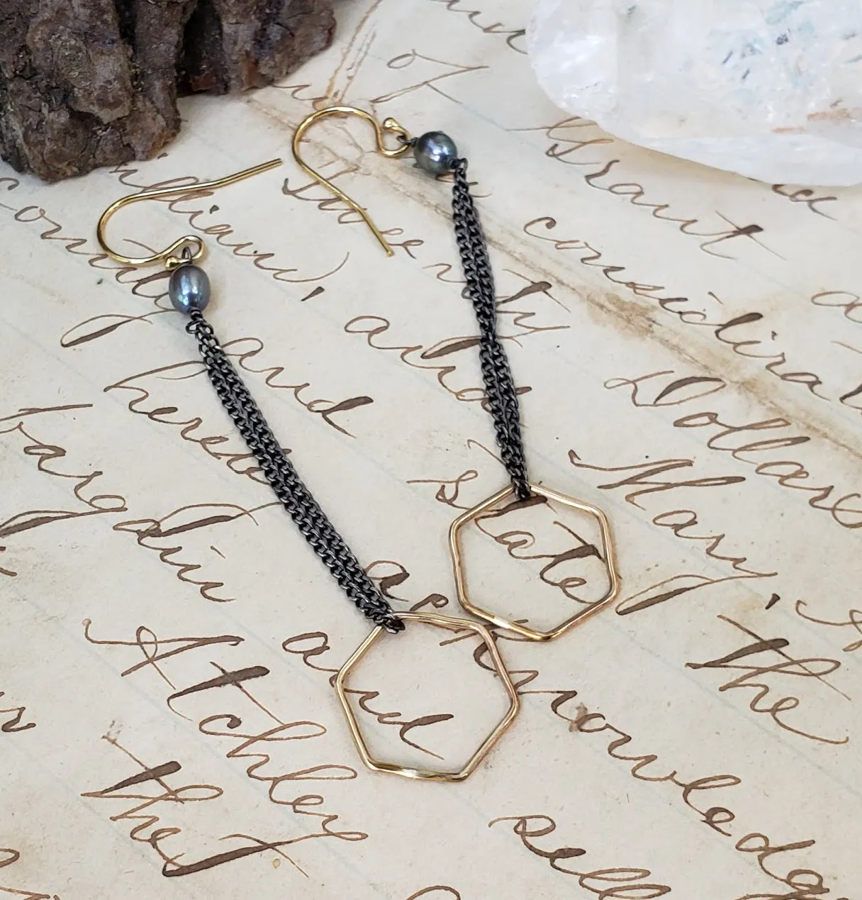 Golden hexagon earrings with patina chains
