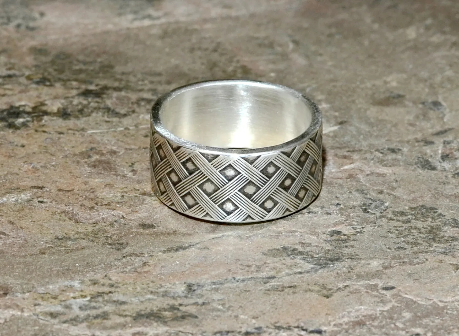 Sterling silver weave ring with dark patina for shadowing and highlighting the design